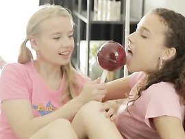 Cute Teen Girls Licking A Lollipop And Each Other